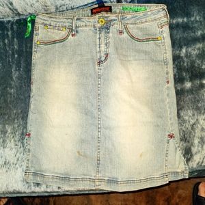 Super cute Dollhouse denim skirt.